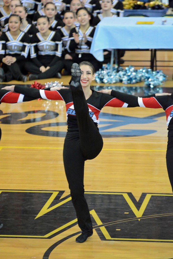 Sabrina Flores on the kick line at the PomPons County Championship, February 2014